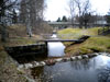 Плотина и пешеходный мост на водосливном канале у старого шлюза № 6-8 "Мустола"